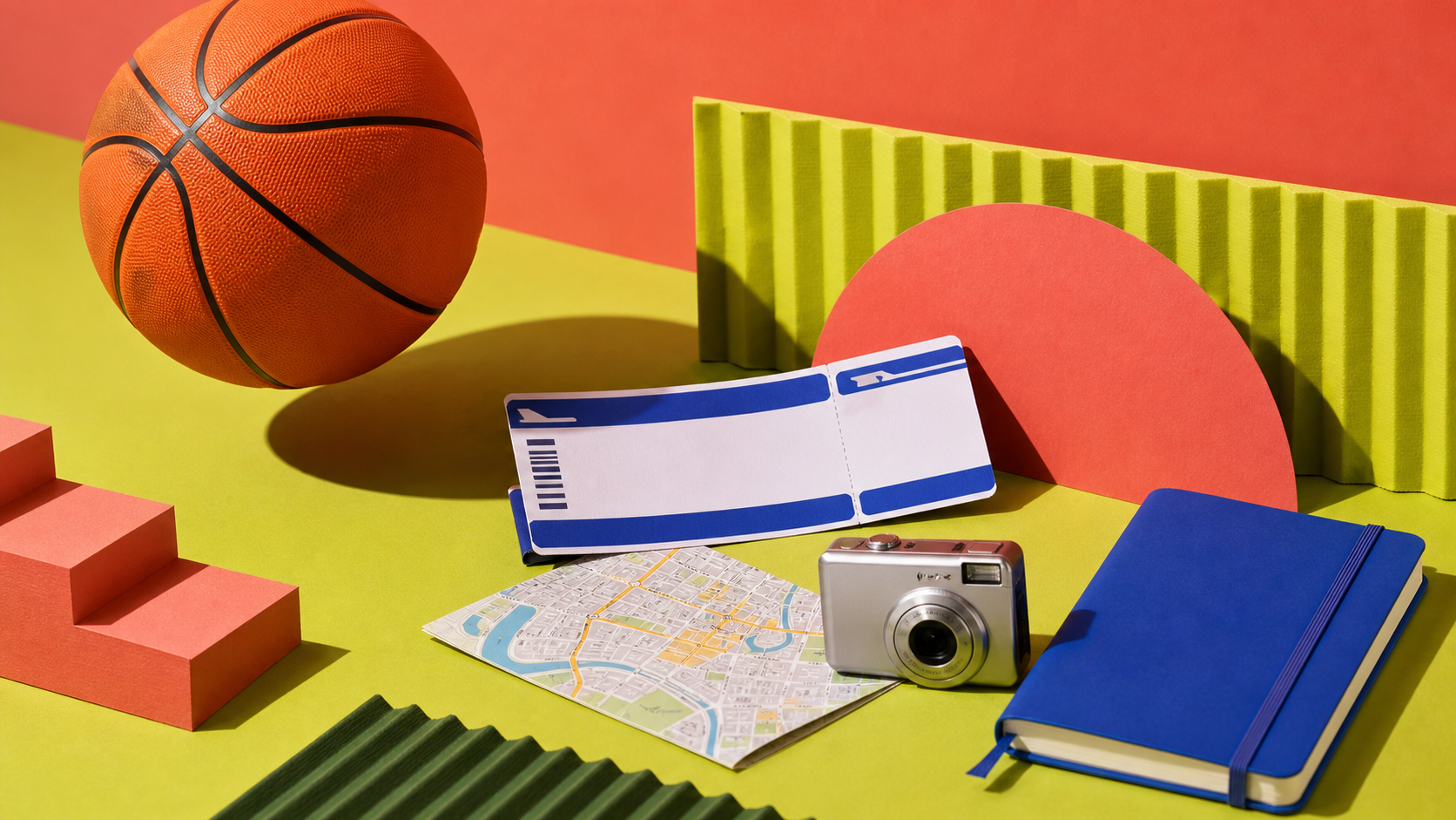 Editorial still life with a basketball, travel ticket, map, camera, and notebook